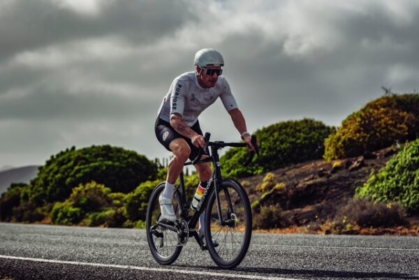 73D0D295-69A0-4CB7-BDE5-482DABDA49B7 Riding bike on road